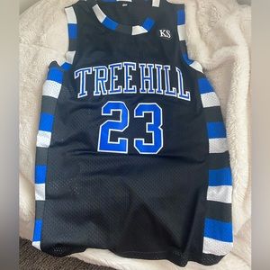 One Tree Hill jersey. Size M, but gives an oversized look.